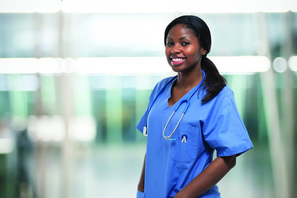nurse smiling environmental with barracks icon