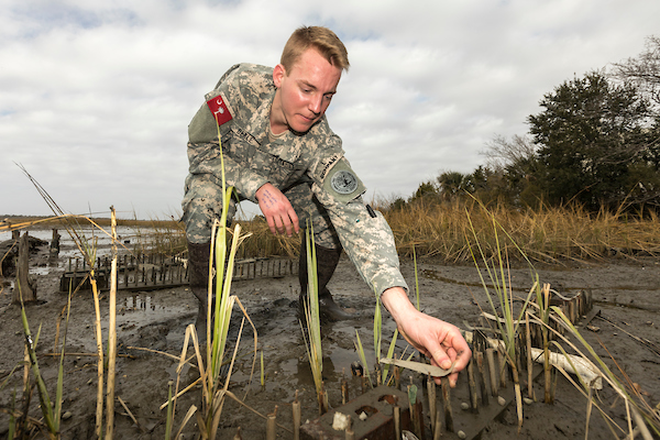 Cadet John Dekle doing an Eco Marsh Study