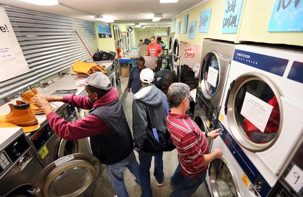 Charleston laundromat serves as gathering place, resource for the needy