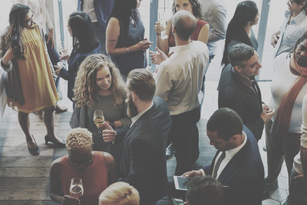 An overhead view of a networking event for young businesspeople