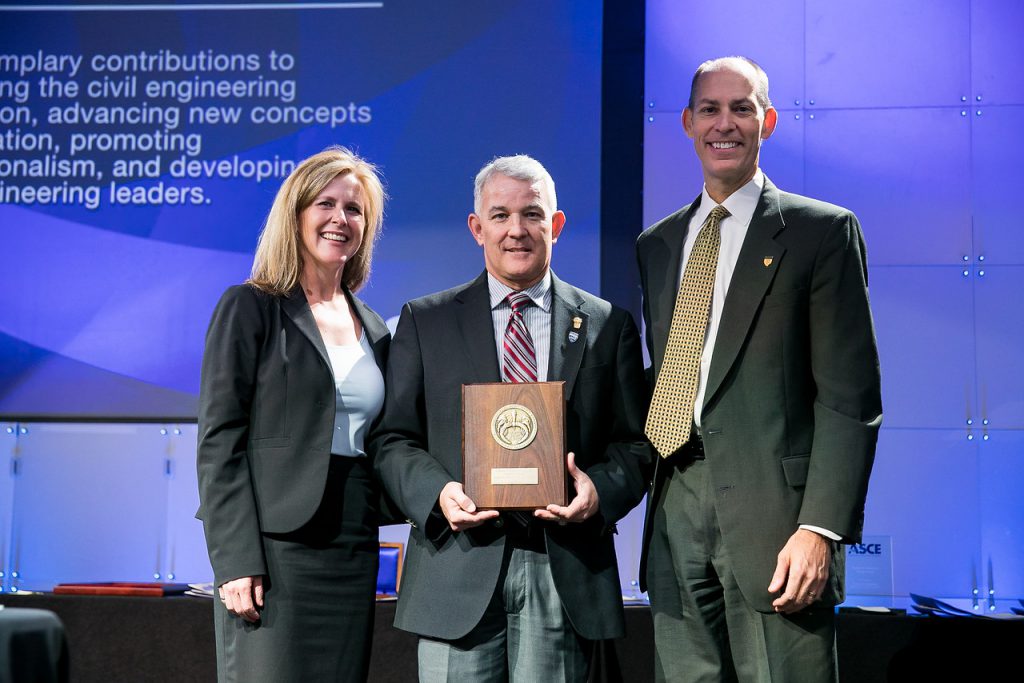 Citadel dean of Engineering, Ron Welch (center) accepts award from ASCE officers in Denver
