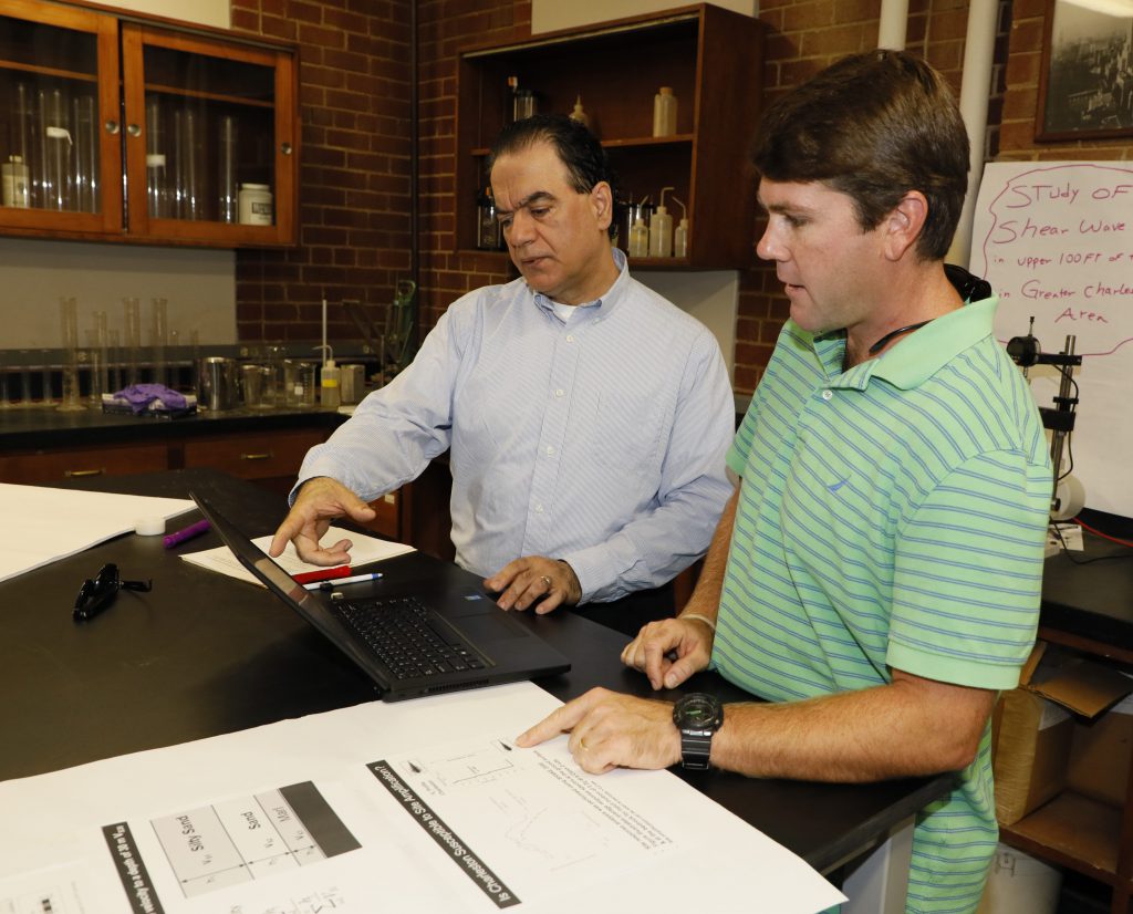 Civil engineering undergrad researcher Emmet Smith (left) with Professor Simon Ghanat