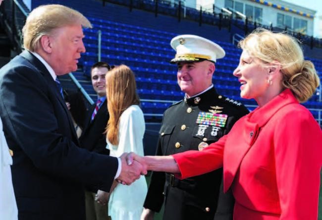 President Donald J. Trump greets Gen Walters and his wife, Gail, during the graduation and commissioning ceremony of the U.S. Naval Academy Class of 2018, Annapolis, Md., May 25.