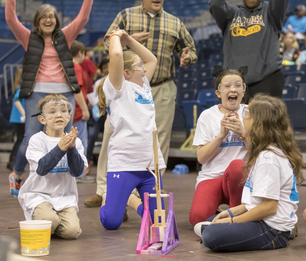 Storm The Citadel 2018 - The Mid Evil Miracles celebrate as their ball lands in the bucket for 3-points at Storm the Citadel, Saturday, Feb. 10, 2018, in Charleston, SC.