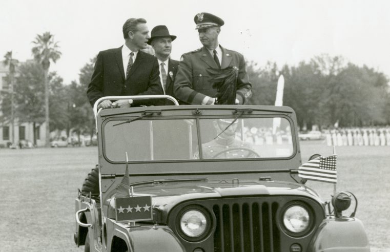 Fritz Hollings (left) with Citadel president Gen. Mark Clark (right) and Sen. Strom Thurmond, in jeep review of South Carolina Corps of Cadets military parade