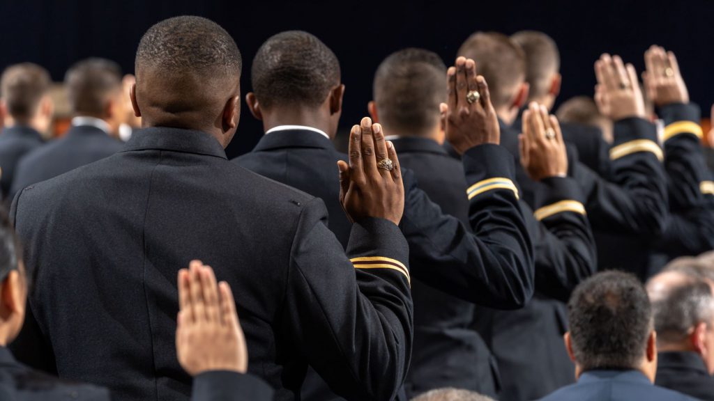 Army commissions saying oath during ceremony