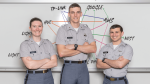 Citadel cadets stand in front of whiteboard with IOT map