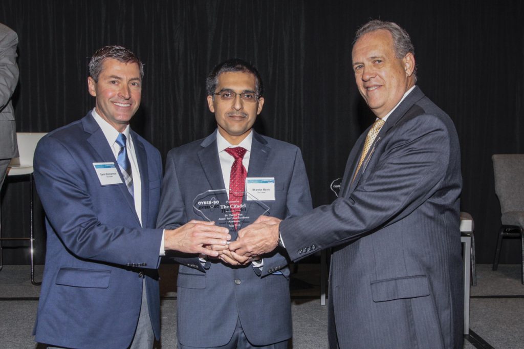 (Left to right) Dr. Darin Zimmerman, Dean for The Citadel Swain Family School of Science and Dr. Shankar Banik, Director of Center for Cyber, Intelligence and Security Studies at The Citadel, accepting award from Cyber SC director Tom Scott.