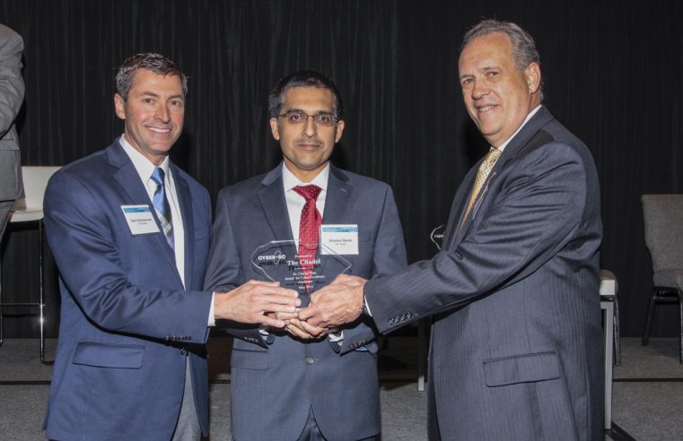 (Left to right) Dr. Darin Zimmerman, Dean for The Citadel Swain Family School of Science and Dr. Shankar Banik, Director of Center for Cyber, Intelligence and Security Studies at The Citadel, accepting award from Cyber SC director Tom Scott.