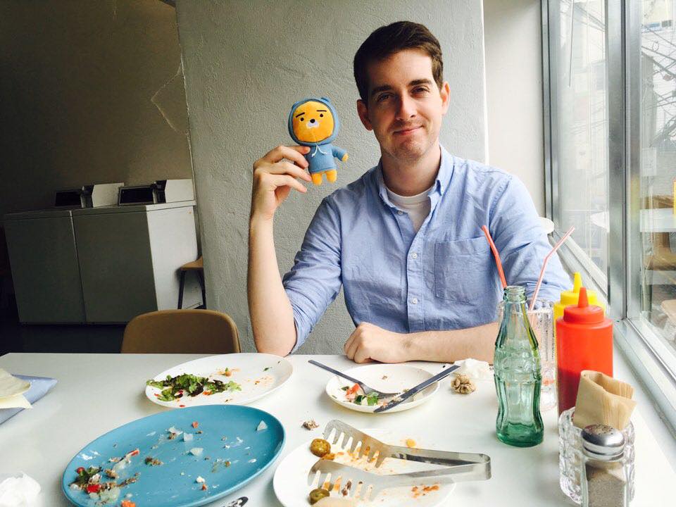 Jonathan French with Korean plush toy