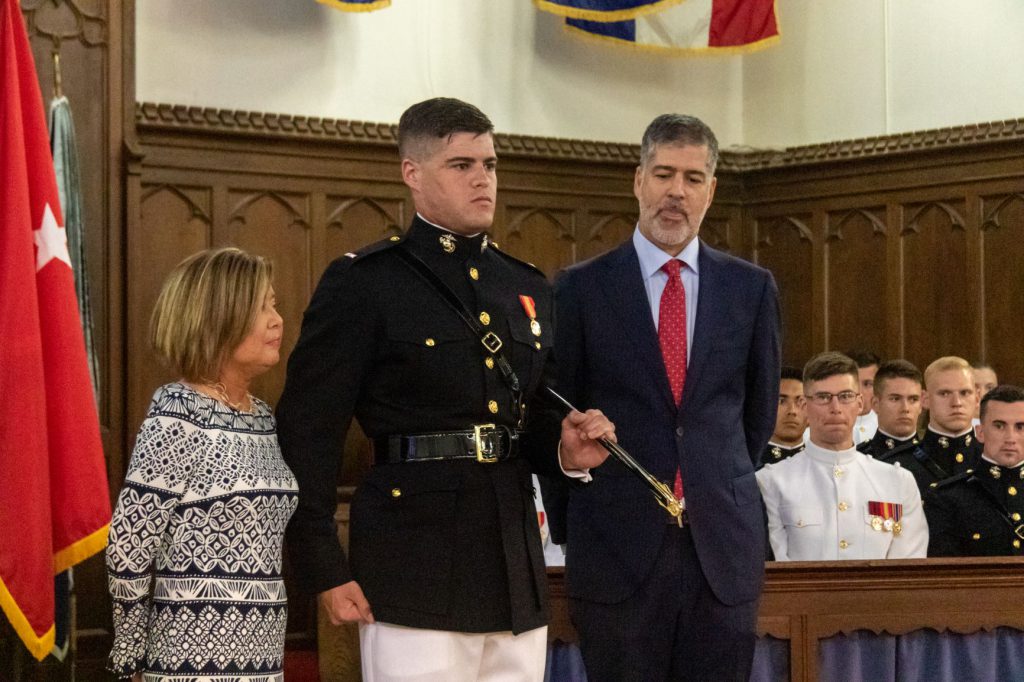 Marine with sword commissioning ceremony