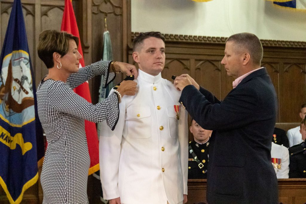 Navy pins commissioning ceremony