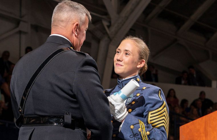 Sarah Zorn with Gen. Walters, president of The Citadel, during commencement 2019