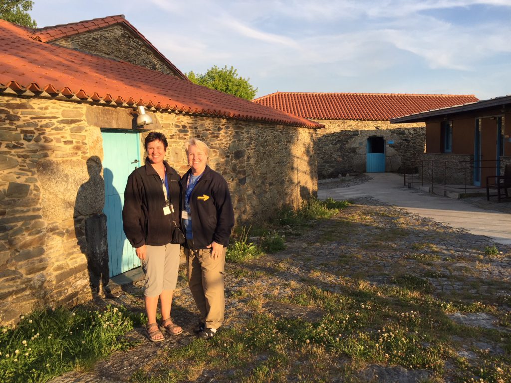 Prof. Alison Smith (left) and a co-volunteer from Indiana University, Prof. Lisa Calvin, working in Spain with the organization American Pilgrims on the Camino