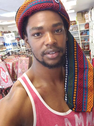 Cam Jackson tries on a turban in Turkey.