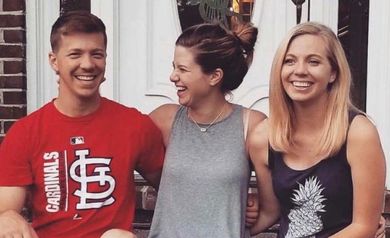 Colleen Riegerix (center) with brother and sister