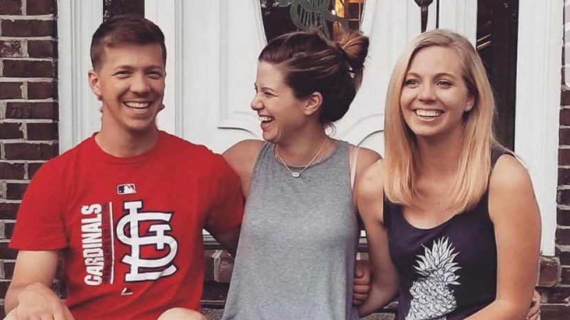 Colleen Riegerix (center) with brother and sister