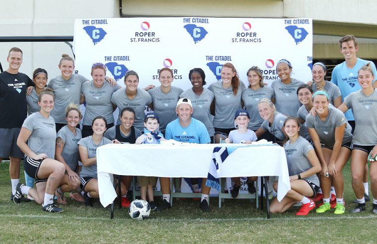 The Citadel women's soccer team with two new members
