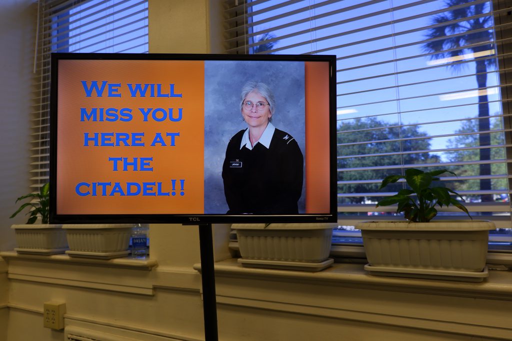  A digital sign with photo of Dr. Julie Lipovsky that says We will miss you at the Citadel.
