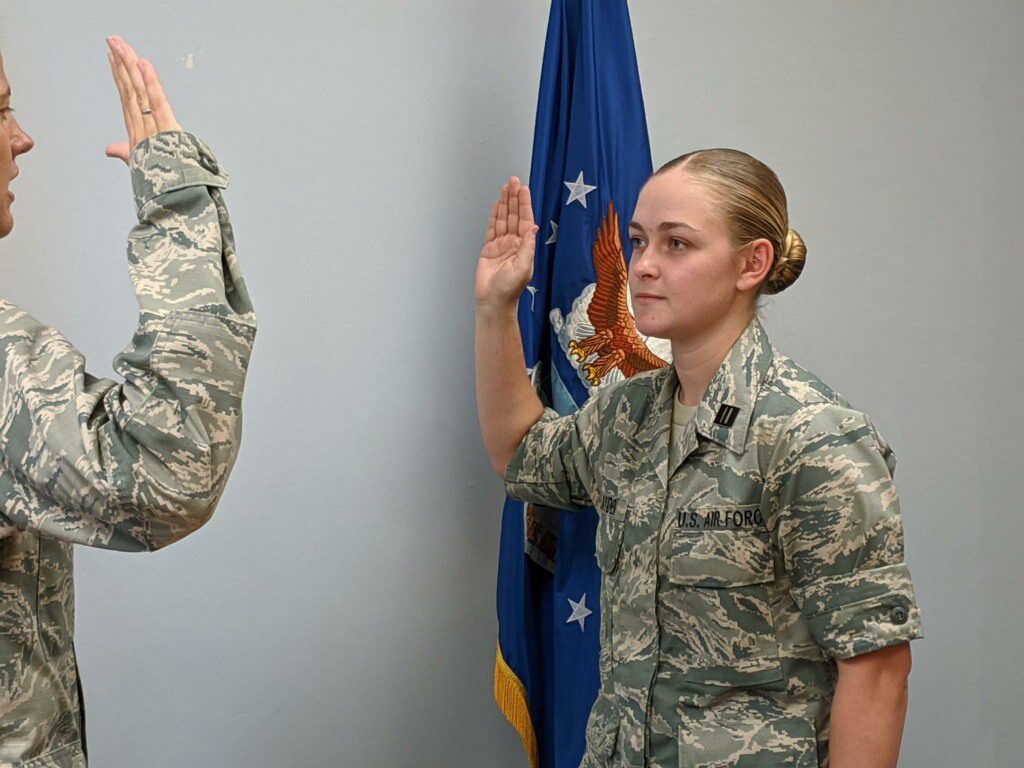 Cadet Lillian Layden being sworn in as USAF ROTC contract cadet