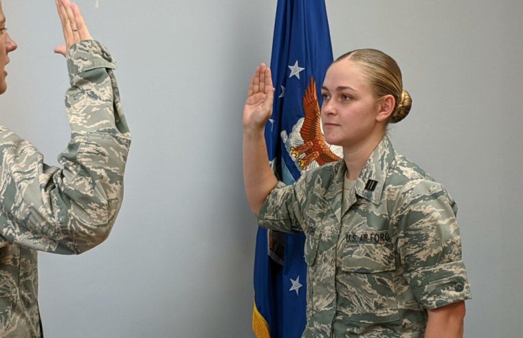 Cadet Lillian Layden being sworn in as USAF ROTC contract cadet