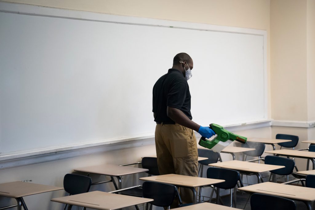 L’Quante Hill demonstrates an electrostatic atomizer in a Capers Hall classroom at The Citadel in Charleston, South Carolina 