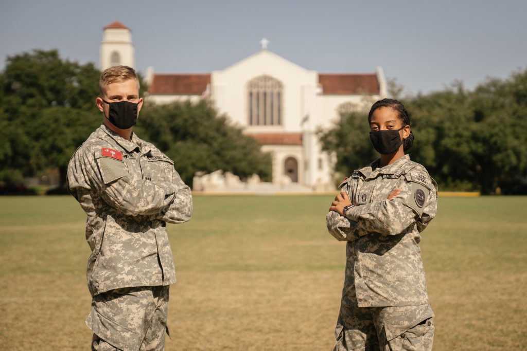 Regimental Commander Nick Piacentini and Regimental public affairs NCO Samantha Walton on Summerall Field