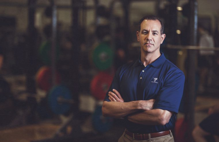 Dr. Dan Bornstein photographed in Citadel weight room in 2018