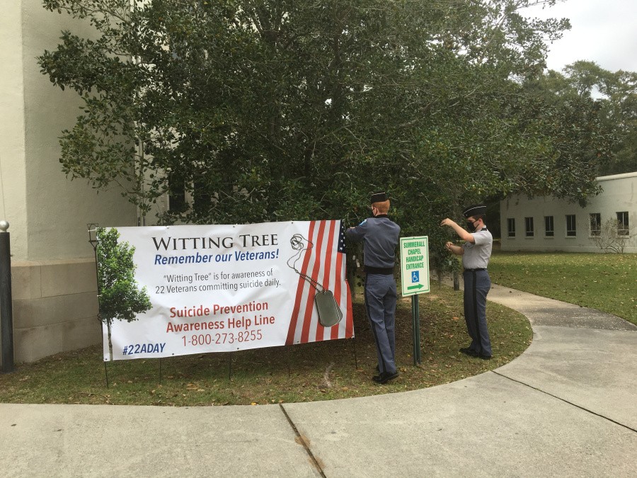 Cadets place dog tags on Whitting Tree on campus