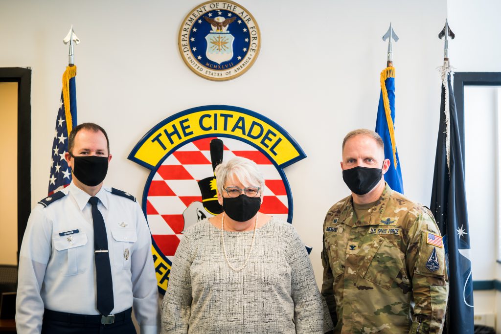 Cheryl Oliver poses for a portrait with Lieutenant Colonel Martin Brabham and Col. Matthew Morand at The Citadel in Charleston, South Carolina on Friday, February 26, 2021. Mrs. Oliver has worked on campus, both on active duty, and after she retired, since 1992. in her time here, she’s helped commission more than 700 cadets into the Air Force, including Cols. Brabham and Morand. (Photo by Cameron Pollack / The Citadel)