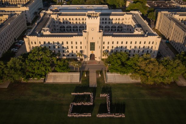 Class of 21 cadets on The Citadel's Summerall Field forming the number 21