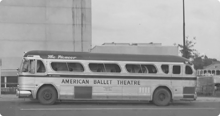 Black and white photo of American Ballet Theater tour bus