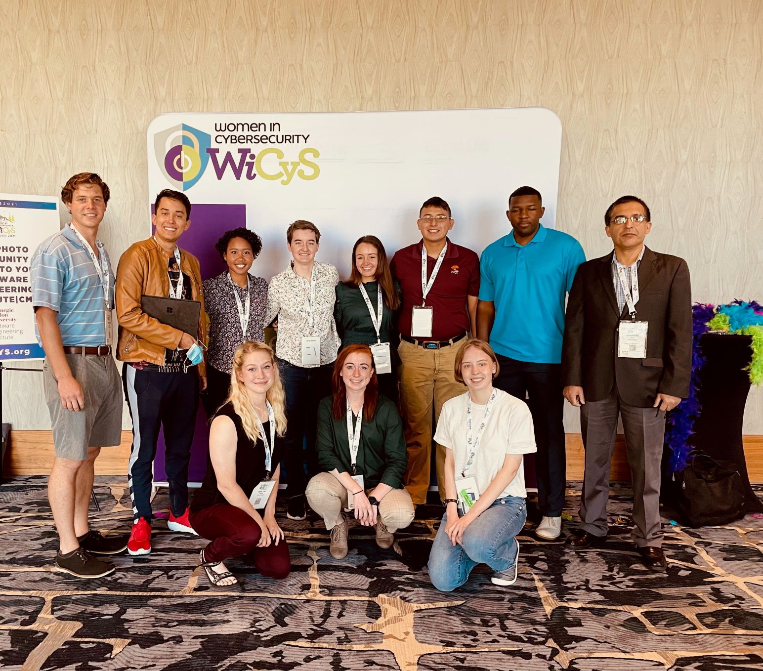 Cybersecurity cadets learning, networking at WiCyS conference The