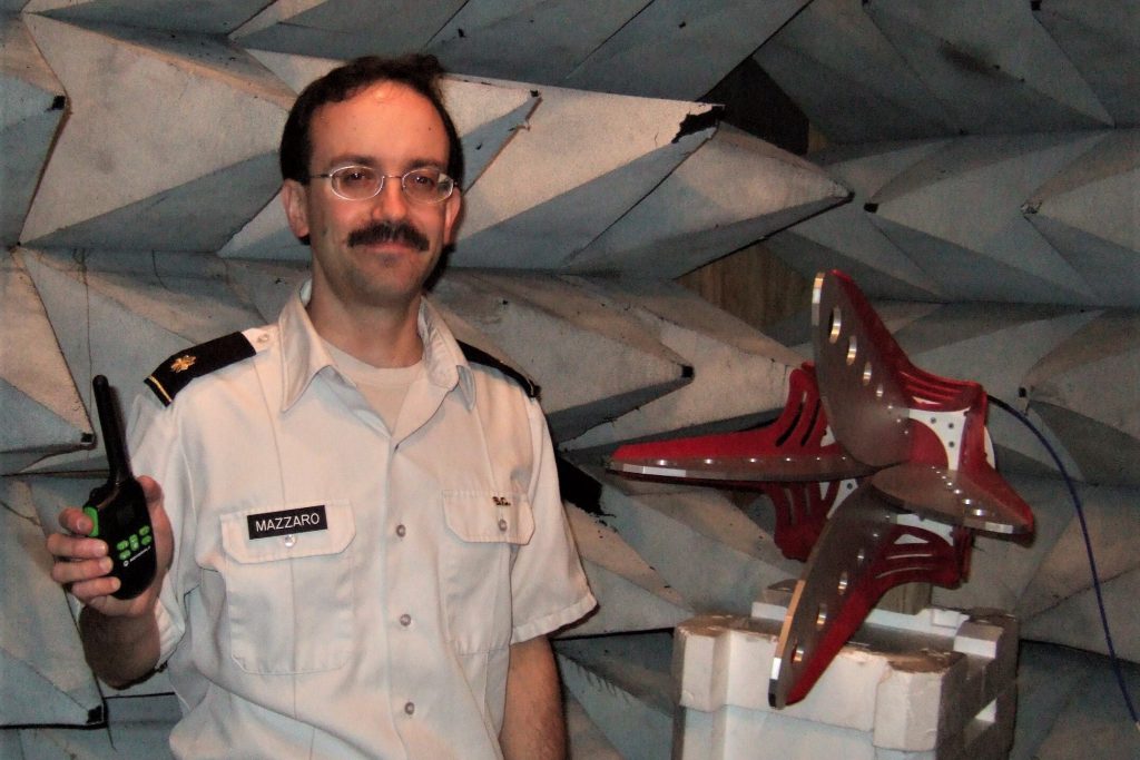 Dr. Gregory Mazarro, professor of electrical engineering at The Citadel pictures with a radar device he patented