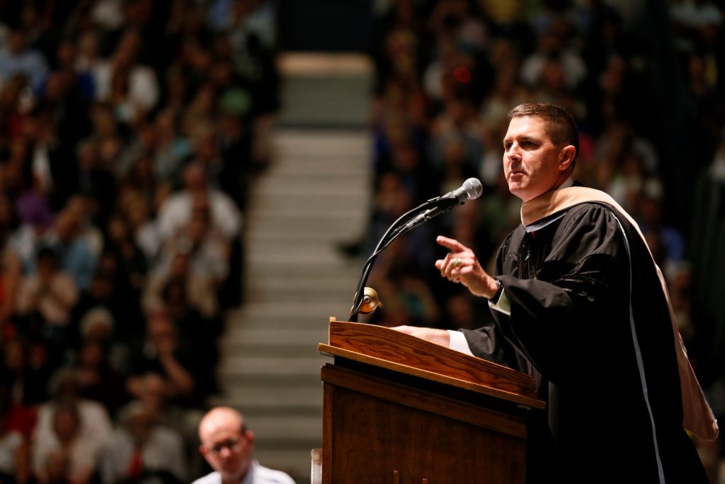 Keller Kissam, Citadel Class of 84, speaking at the 2015 Commencement Ceremony at a podium