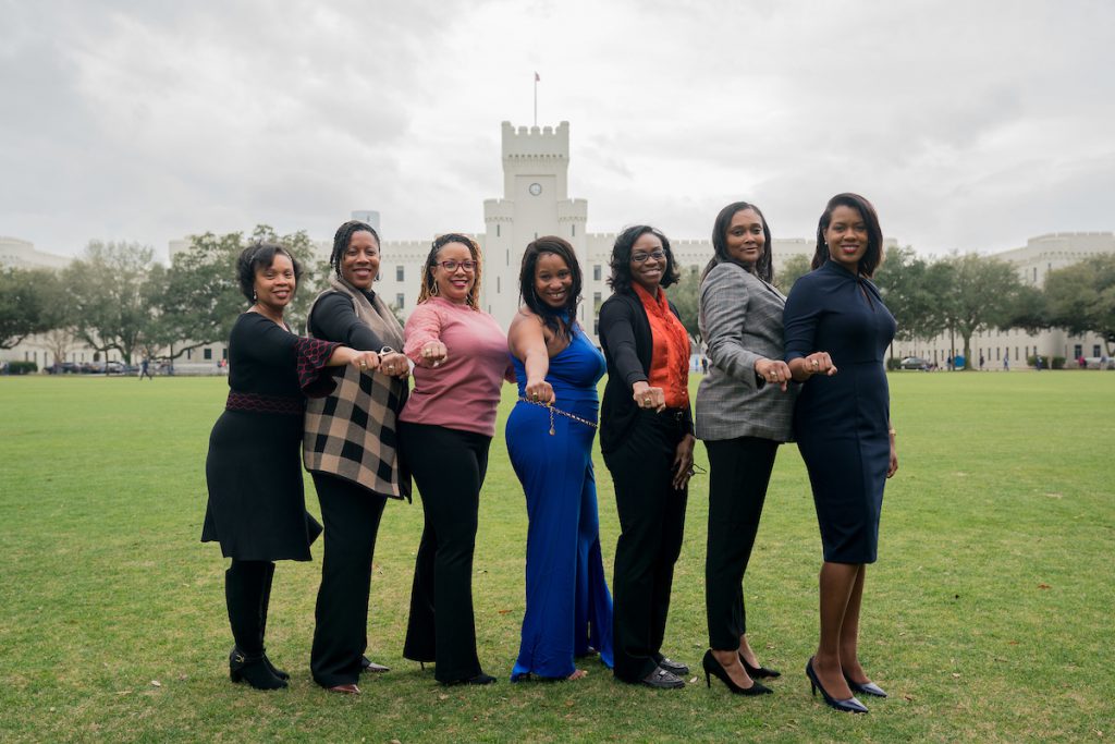 Adrienne “AJ” (Watson) Crosby, Toshika “Peaches” Hudson-Cannon, Dr. Renee E. Hypolite, Natosha Mitchell Johnson, Jamey McCloud, Geneive “Hardney” Marshall and Lesjanusar “Sha” Peterson, pose for photos on Summerall Field in Charleston, South Carolina on Friday, February 4, 2022.