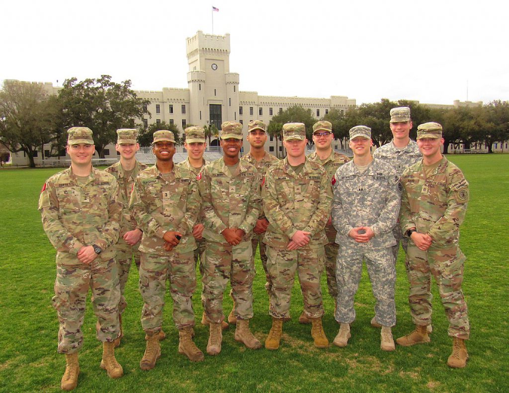 Cadet founders of the Hollings Society standing on Sumemrall Field