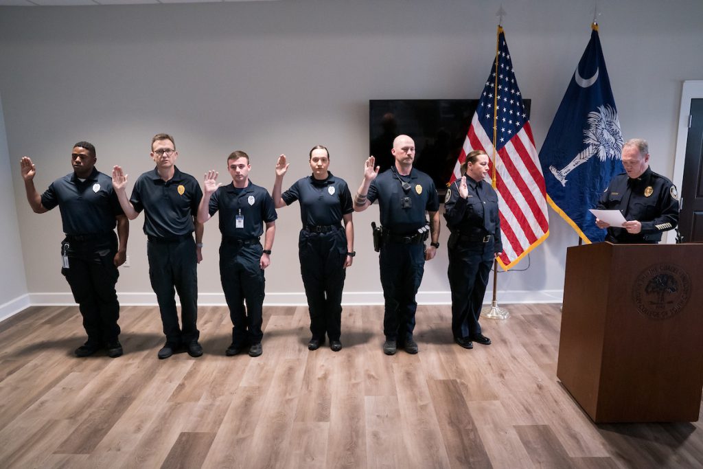 The Citadel Department of Public Safety hosts a Oath Ceremony for Sergeant Reagan Moore, Private First‐Class Cameron McNeill, Community Service Officer Brandon Birsner, Imani Bowie, David Desplaces and Chelsea Sitarik at the Swain Boating Center in Charleston, South Carolina on Tuesday, March 1, 2022. The ceremony was the first time current cadets were sworn in as community service officers. Credit: Cameron Pollack / The Citadel