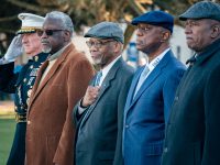 Members of the Class of 1973 stand with Gen. Glenn Walters during parade.